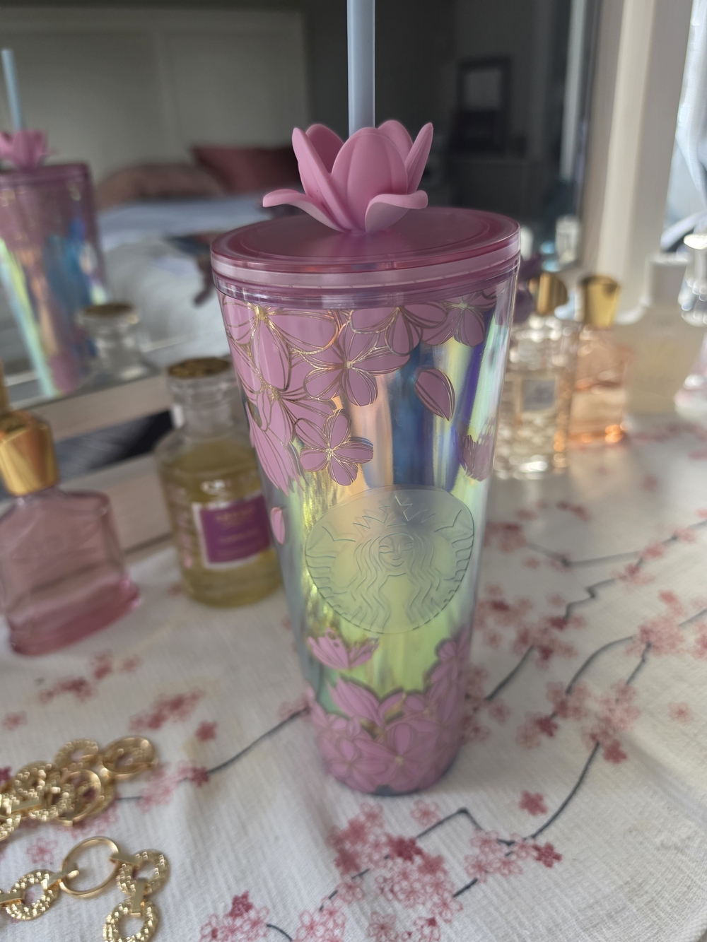 Pink Starbucks Cherry Blossom cold cup featuring an iridescent finish
